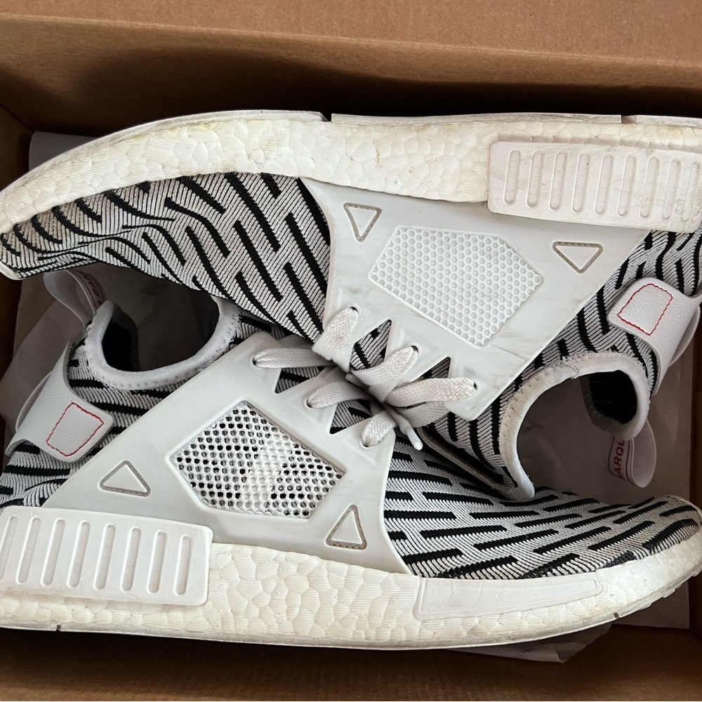 Men’s black & white Adidas NMD’s
